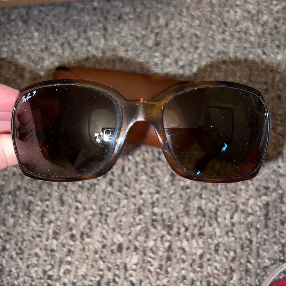 Ray-Ban style RB4068, polarized and comes with the case in new condition.